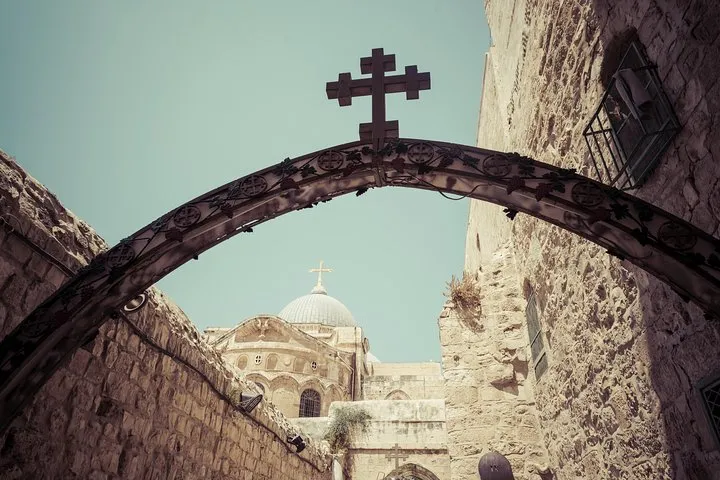 Pilgrims walking the Via Dolorosa on a footsteps of Jesus Jerusalem Old City tour